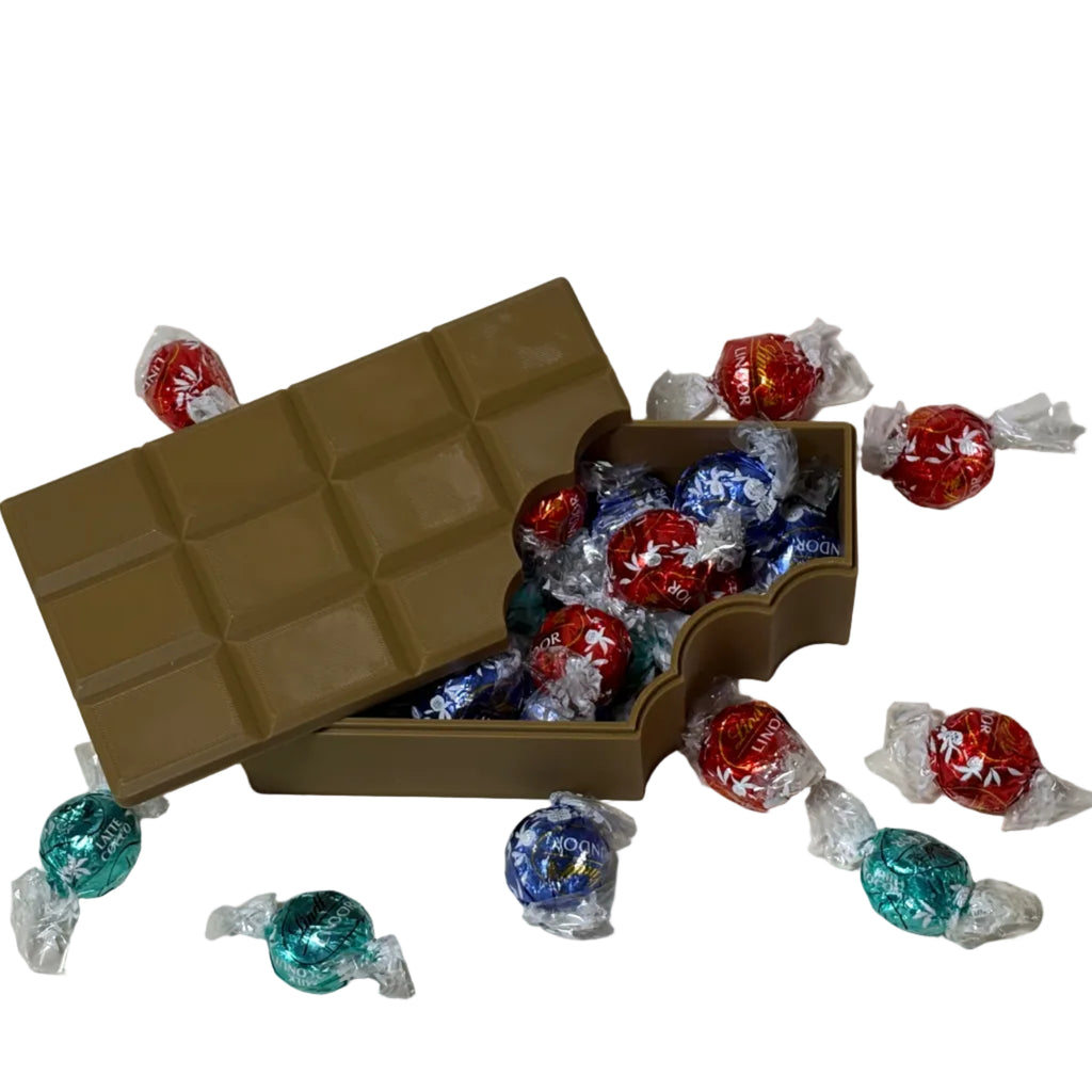 3d printed brown chocolate storage box with chocolates to show how it functions 