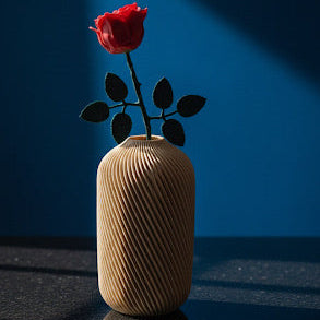 3d printed scandinavian inspired vase with a rose 