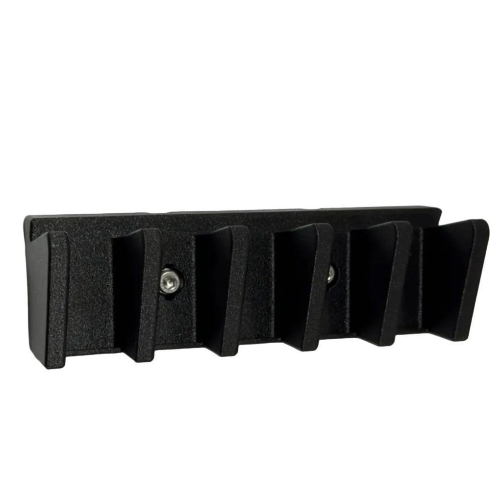Black wall-mounted hook with five slots on a light gray background