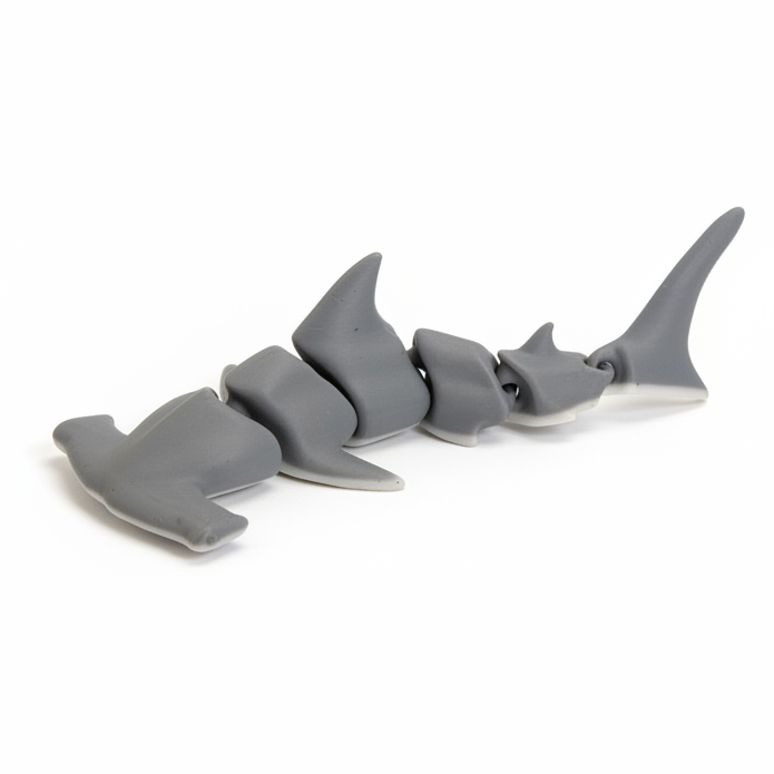 Hammerhead shark toy on white background