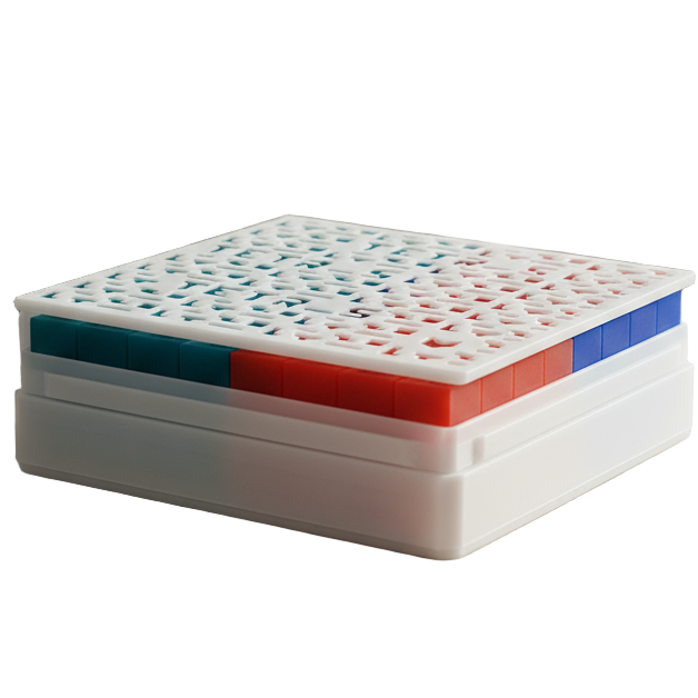 Stack of colorful books on a wooden table with a blurred indoor background