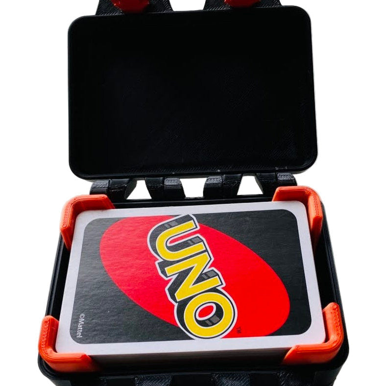 UNO card game set in a black carrying case with red accents